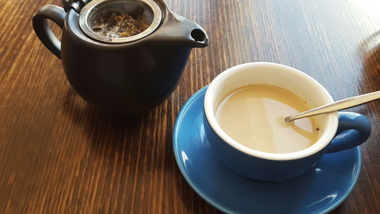 Cup of tea in blue ceramic cup
